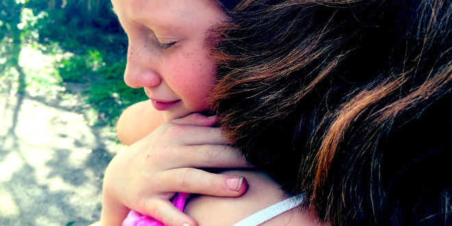 helping children cope with loss icon child hug